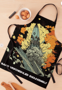 apron With Rapid Unscheduled Disassembly cartoon graphic of rocket exploding